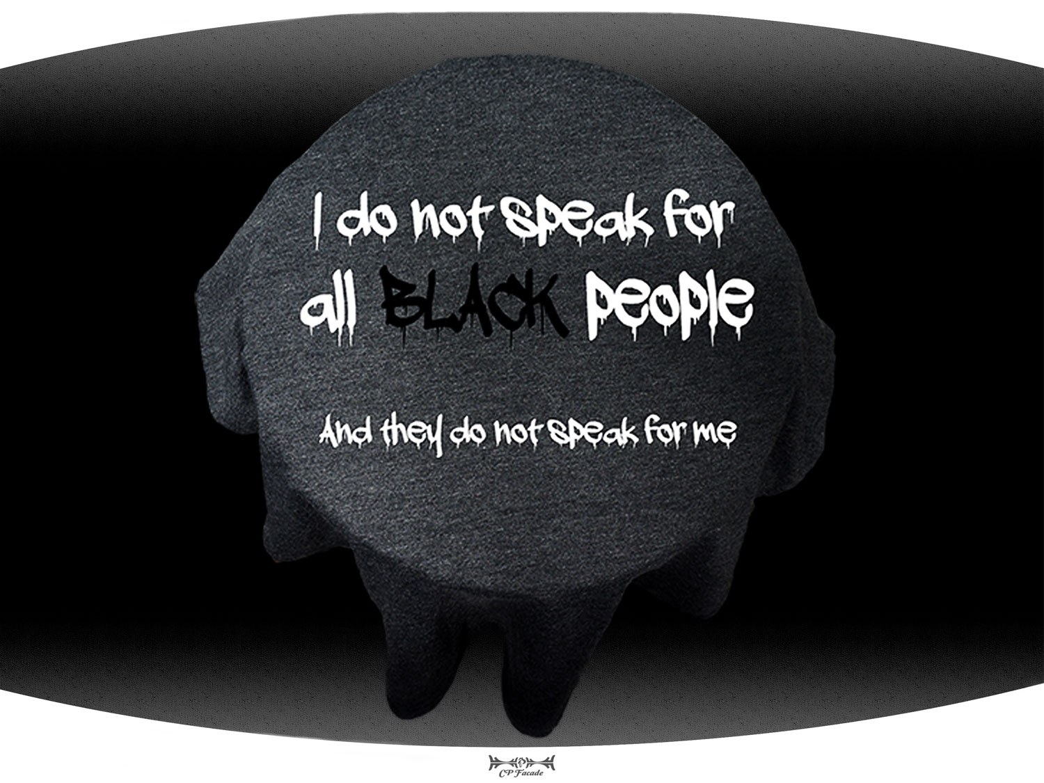 Close up of dark grey t-shirt with the phrase I do not speak for all black people on the front of it