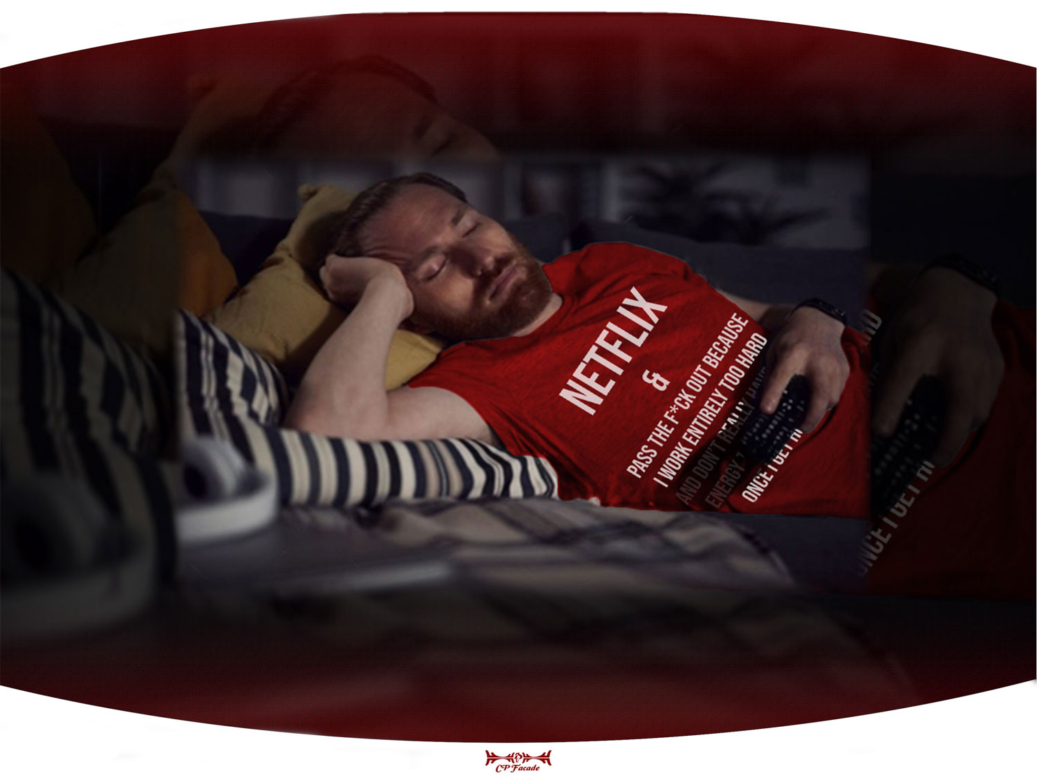 Guy passed out holding tv remote while wearing red Netflix and chill t-shirt with funny text on the front of it.